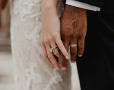 Couple holding hands symbolizing love and lifelong journey together
